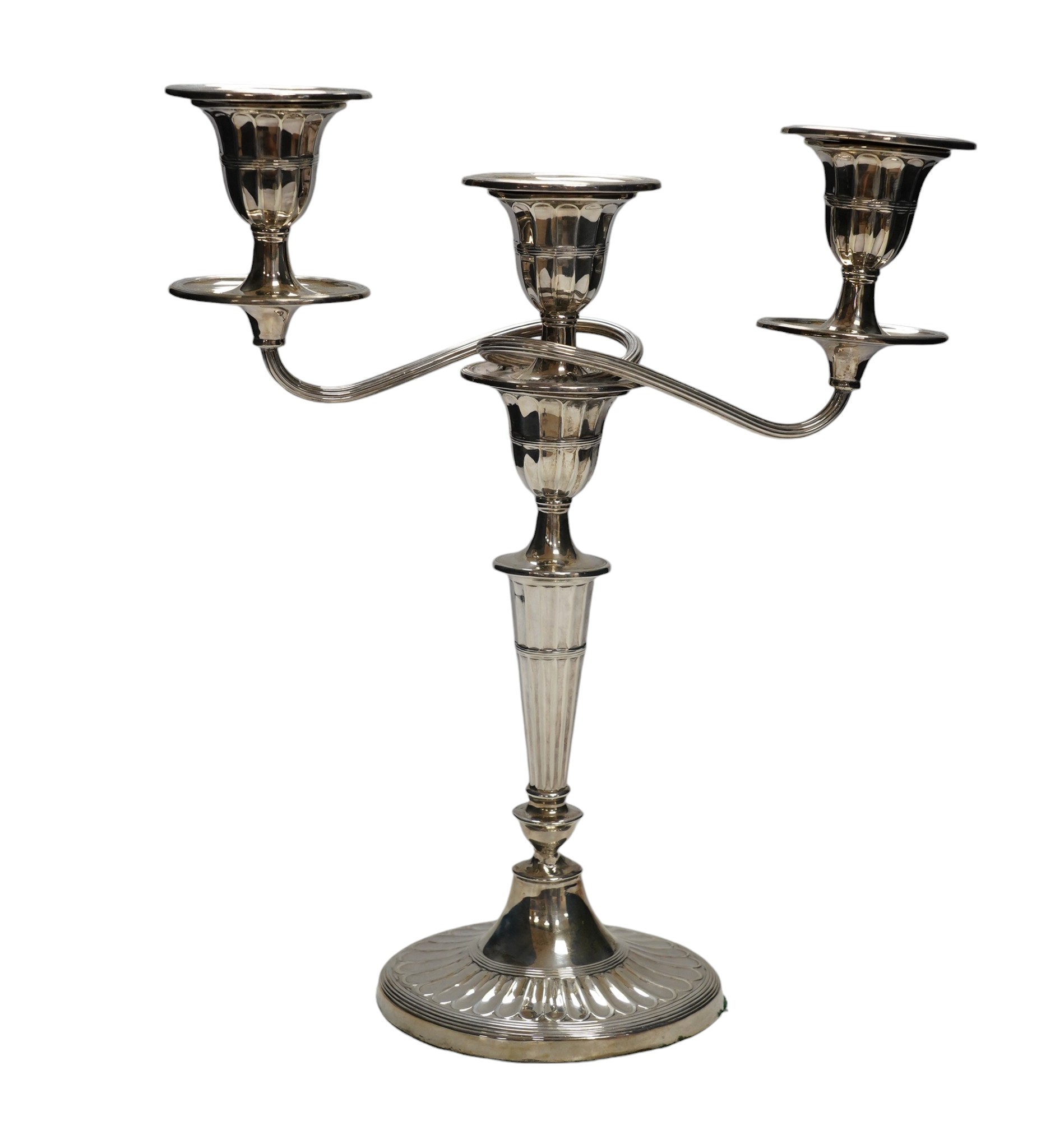 A late Victorian silver two branch, three light candelabrum, Edward Hutton, London, 1891, height 30.7cm, weighted. Condition - fair